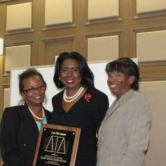 Buford  and Perkins present a Law Day award to Dorothy Brown.