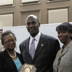 Andrea Buford (left) and Marian Perkins (right) present Martin Greene with a Law Day Award.