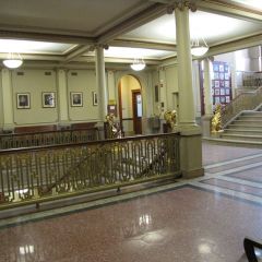The ornate 2nd floor lobby with marble floors and four rams covered in 14K gold flanking each staircase.