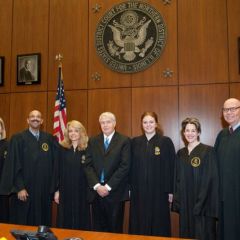From left to right: Nicole Kopinski, Treasurer; Pierre Priestley, Vice Justice; Michele Jochner, Justice; Bob Downs, Chairman of the Board; Shannon Riefsteck, Marshall; Barbara Andersen, Secretary; Judge Holderman. 