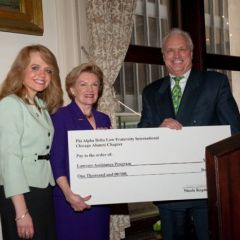 In furtherance of the fraternity's mission of service, past Chapter Justice Royal F. Berg and Michele Jochner present a check for $1,000 to Janet Piper Voss, Executive Director of the Lawyers Assistance Program, in support of LAP.