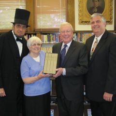 President John O'Brien presents the "Papers of Abraham Lincoln" to the Belvidere Library.