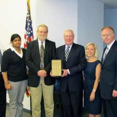 ISBA President John O'Brien presented "The Papers" to the Peoria Heights library on Wednesday, May 26. On hand for the presentation were (left to right): Tim Cassidy of Cassidy & Mueller; Lisa Joseph and Phil Lenzini of Kavanagh Scully Sudow White & Frederick; ISBA President O'Brien; Elizabeth Jensen, also of Kavanagh Scully and a member of the ISBA Board of Governors; and Justice Thomas Kilbride