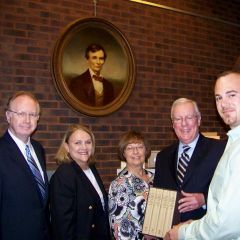President John O'Brien presented "The Papers of Abraham Lincoln" to the Pekin Library on Wednesday, May 26. On hand for the event were (left to right): Justice Thomas Kilbride, Sue Bositch, Vickie Koch (library board president), President O'Brien, and Jeff Brooks 