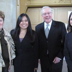 Click to enlarge: Justice Susan F. Hutchinson, law student Nhu, ISBA President John O'Brien and law student Jamie Esser