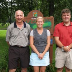 Bill Howard, Jennifer Speckman and Rob Torbert get ready to tee off