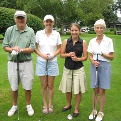 Keith (left) and Nancy Hyzer (right) of Hyzer & Jacobs are joined by more recent golfers Kaycee and Emily Chadwick