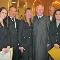 New admittee Natasha Steele, her father, ISBA member Robert Steele, ISBA Treasurer Karen Enright, Chief Justice Thomas L. Kilbride; new admittee Abigail Fleming and her father, ISBA member John Fleming