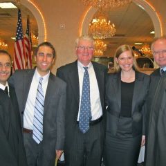 Associate Judge James L. Brusatte with his son, new admittee Michael Brusatte, Judge Eugene P. Daugherity with his daughter, new admittee Anne Daugherity and Chief Justice Thomas L. Kilbride
