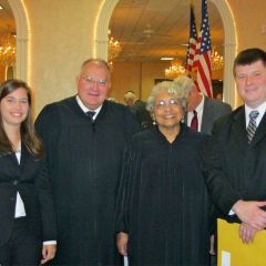 New admittee Jessica Fiocchi, Justice Robert L. Carter, Justice Mary McDade and new admittee Brandon Brown