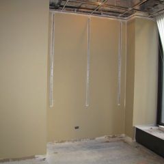 One wall of this office has been painted.