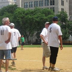 ISBA Board members talk strategy before the game.