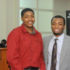 Sidney Butler (left) accepts the Thurgood Marshall Award from teacher Tyreese Foreman