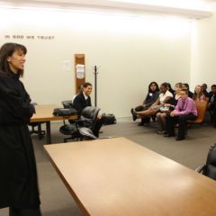 Judge Liu speaks with the students.