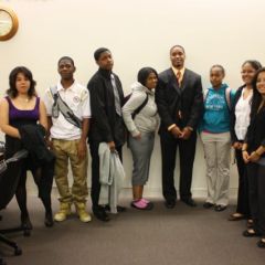 Teacher Terrance Garmon (4th from left) with students in the Daley Center.