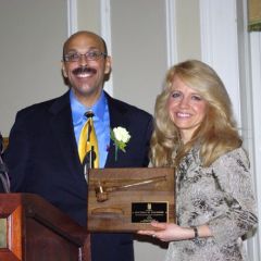 Chapter Justice Pierre Priestley presents immediate Past Justice Michele Jochner with a plaque commemorating her two-year term as the Chapter's leader.