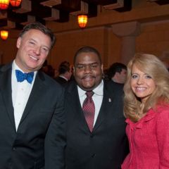 ISBA President-Elect John Locallo and Chicago Alumni Chapter Justice Michele Jochner greet a Phi Alpha Delta law student member from the NIU College of Law
