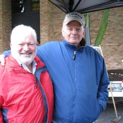 Fifth District Appellate Justice Richard Goldenhersh and Belleville lawyer Bruce Cook stay close to the slow cooker. Ribs, chicken and other BBQ staples were served.