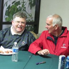 John O'Gara and John English find a dry spot inside to rehash recent legal lore. English served many years on the ISBA Judicial Evaluations Committee. O'Gara is Public Defender of St. Clair County.