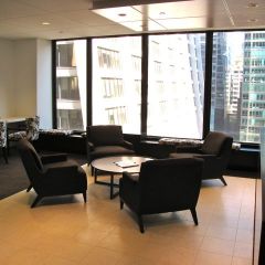 Main lobby and reception area with member workstations at left