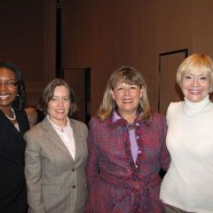 ISBA 2nd Vice President Paula H. Holderman (second from right) with friends at the reception.