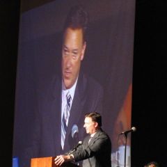 ISBA President John G. Locallo introduces award recipient Paula H. Holderman