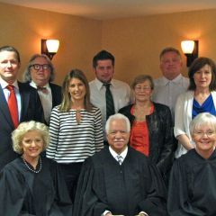 New admittee Michael Synowiecki and family with the Supreme Court Justices