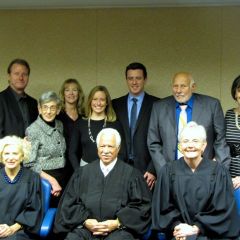 New admittee Jonathon Walton and family with Justices Burke, Freeman and Theis