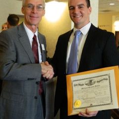 New admiteee Michael G. Butts (Bloomington) with ISBA Treasurer Hon. Stephen R. Pacey 