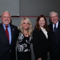 Michele Jochner, Chair of the Executive Board of the Chicago Alumni Chapter, visits with Board members Royal F. Berg, Julie Ann Sebastian, and John O'Brien, a past president of the ISBA.