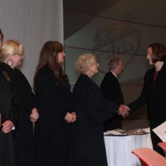 Illinois Supreme Court Justice Anne M. Burke and other members of the fraternity's leadership welcome Sidley & Austin partner Erin Kelly to the group.