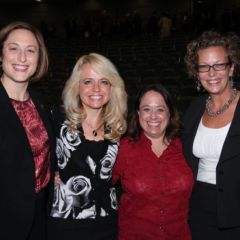 Michele Jochner (second from left) and Chicago Alumni Board member Deidre Baumann (second from right) welcome new members Erin Kelly and Kimberly Voichescu, a student at DePaul University College of Law.