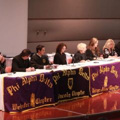 Illinois Supreme Court Justice Anne M. Burke and other Phi Alpha Delta leaders preside over the initiation ceremony.