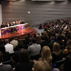 The new initiates hear about the principles of membership into the fraternity.