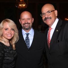 Honorees Michele Jochner and Judge William Hooks visit with Shawn Kasserman (center). 