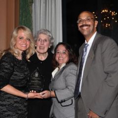 Michele Jochner receives the award from its namesake, Justice Mary Ann G. McMorrow (Ret.), Event Chair Deidre Baumann, and  Pierre W. Priestley, Justice of the Chicago Alumni Chapter of Phi Alpha Delta. 