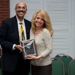 Presentation of the Chapter's Centennial Award by Chapter Justice Pierre Priestley to Past Chapter Justice Michele Jochner.