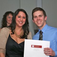 YLD Soiree Co-Chair Gina Rossi presents a raffle prize 