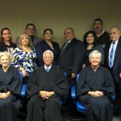 New admittee Joanna Panici and family with Justices Burke, Freeman and Theis.