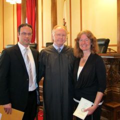 New admittee Nick Nelson, Chief Justice Thomas L. Kilbride and mother Kathy Nelson.
