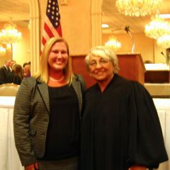 New admittee Nichole Mahrt and Justice Mary W. McDade
