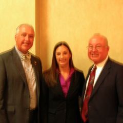 ISBA 2nd Vice President Umberto S. Davi congratulates new admittee Megan Cantlin and her father. ISBA member John (Jack) Cantlin. Megan became Jack's fifth child to be admitted to the bar.
