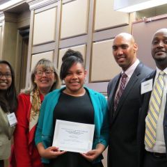 Event co-chairs Kenya Jenkins-Wright (left) and David Kadzai (right) with ISBA President-elect Paula H. Holderman, a student accepting the 1st place prize on behalf of Karsyn Terry of Skinner High School and CCBA President John A. Fairman. 