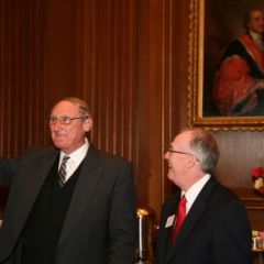 ISBA President John Thies presents a plaque to retiring Supreme Court Clerk William Suter
