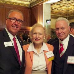 President Umberto S. Davi is shown (from left) with class member Christine Smith and Class of 1962 member Eugene McMahon. 