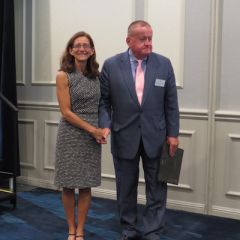 Dean Jennifer Rosato Perea, Board of Governors Award recipient,&nbsp;and President Russell Hartigan

