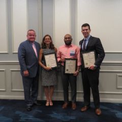 President Russell Hartigan, Jennifer Rosato Perea, Cory White, and George Schoenbeck, III
