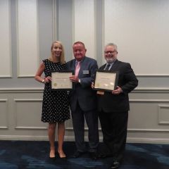 Jessica Hegarty, President Russell Hartigan, and Curtis Ross

