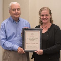 Patrick Driscoll receives an award
