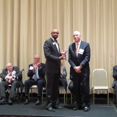 Vincent Cornelius presents Michael Reagan his award
